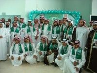 معالي مدير ووكلاء وعمداء جامعة سلمان بن عبدالعزيز يتوشحون بالأعلام الخضراء في حفل اليوم الوطني