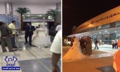 بالصور.. عروس بفستان فرحها بمطار ينبع.. تدهش الحضور